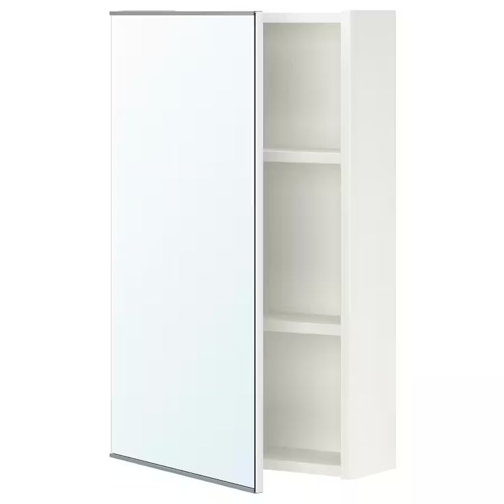 the medicine cabinet is white and has two shelves on one side, and an open door on the other