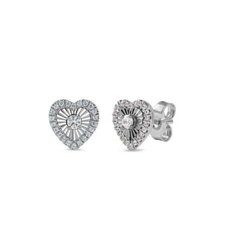 Treat yourself or your loved ones to the sparkle of this stunning diamond heart stud earrings. Crafted in sterling silver, each stud showcases a sparkling round cut diamond prong set at the center of a heart shape frame, artfully set with a miracle plate to enhance the look and sparkle. Round diamond line along the edges of the heart shape frame completing this beautiful look. These earrings are secured by post with friction back. Dazzling with 1/5 ct.t.w. of diamonds and a brilliant buffed lust Valentine's Day Round Cut Diamond Earrings For Anniversary, Valentine's Day Sterling Silver Diamond Cut Earrings, Valentine's Day Diamond Cut Round Diamond Earrings, Valentine's Day Round-cut Diamond Earrings, Vvs Clarity Diamond Earrings For Valentine's Day, Heart-shaped Diamond Earrings With Accents For Valentine's Day, Valentine's Day Round Diamond Earrings With Vvs Clarity, Valentine's Day Fine Jewelry Diamond Earrings With Accents, Valentine's Day Vvs Clarity Diamond Round Earrings