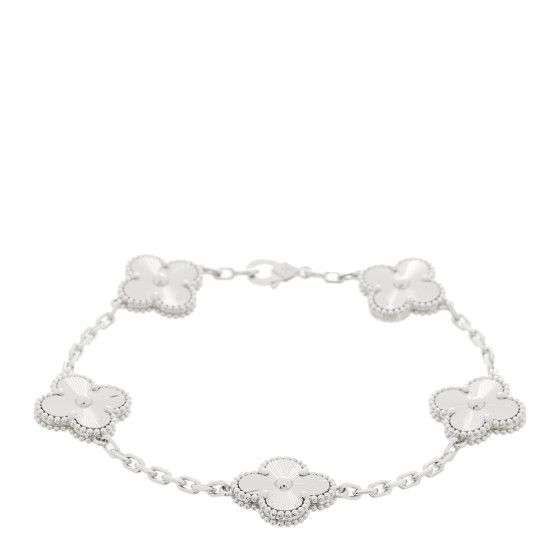 This is an authentic VAN CLEEF & ARPELS 18K White Gold 5 Motifs Guilloche Vintage Alhambra Bracelet. The bracelet is crafted of 18 karat white gold and features five Guilloche textured clover motifs on a high polished chain. Van Cleef Arpels Bracelet White Gold, Vintage Van Cleef And Arpels Jewelry, Van Cleef Clover Bracelet, Van Cleef White Gold, White Van Cleef, Jewelry Van Cleef, Van Cleef Bracelet, Vintage Alhambra Bracelet, Alhambra Bracelet