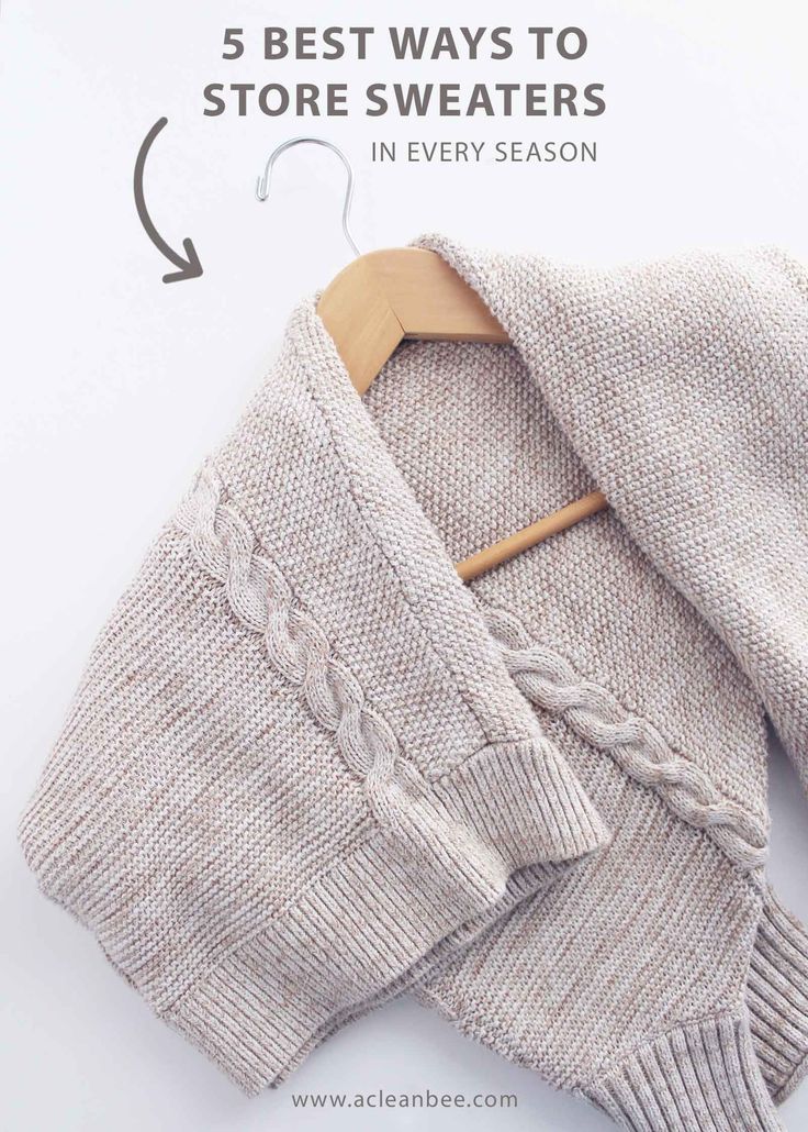 THE BEST WAY TO STORE SWEATERS Fold Sweater On Hanger, How To Fold A Sweater Over A Hanger, How To Hang A Sweater On A Hanger, How To Organize Sweaters In Closet, Fold Bulky Sweaters, How To Fold Sweaters, Hang Sweaters, Store Sweaters, Folding Tips