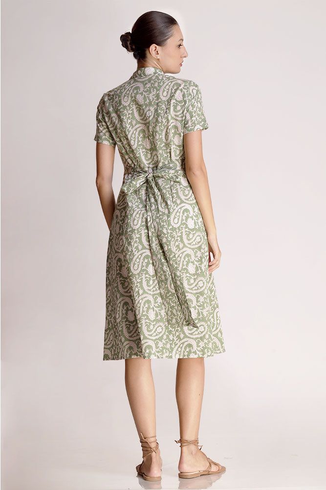 The Alicia shirt midi dress is a springtime staple. Crafted with care from cotton, its charming block print adds flair to its warm green shade. Featuring a collared design and front button closure, this jade short-sleeve maxi dress exudes casual elegance. With two handy pockets, it's as practical as it is stylish, making it perfect for effortless chic on sunny days.Material: Cambric - 100% cottonStyle/Print: Hand Block PrintNumber of Pockets: 2Length: 45 inchesOccasion: CasualColor: Jade Summer Cotton Maxi Shirt Dress, Short Sleeve Cotton Dress For Work, Spring Cotton Collared Midi Dress, Spring Cotton Midi Dress, Spring Cotton Knee-length Shirt Dress, Fitted Maxi Length Cotton Shirt Dress, Fitted Cotton Maxi Shirt Dress, Cotton Midi Dress With Floral Print For Work, Fitted Cotton Midi Shirt Dress