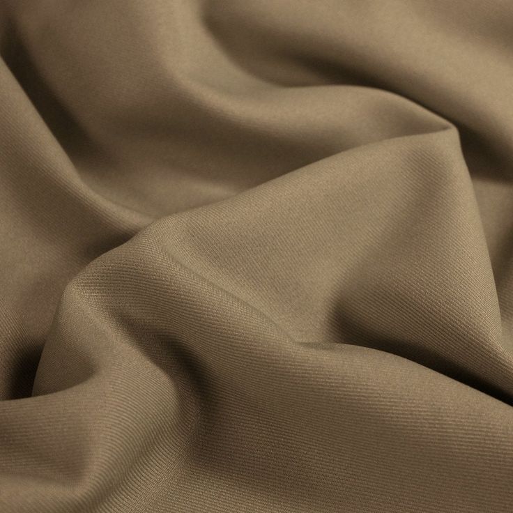 a close up view of a plain tan fabric