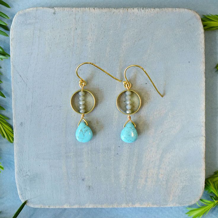 Brass and gold earrings with glass and Turquoise gemstone pendants. Turquoise, the December birthstone, is the gemstone of protection, hope and tranquility. These earrings are handmade with - Turquoise pendants - Glass beads - 14k Gold on stirling silver French Hooks - Raw brass frames - Gold wire 1.125"x.5" each Amazonite Drop Earrings As Gift, Dangle Earrings With Amazonite And Natural Stones, Turquoise Amazonite Nickel-free Jewelry, Nickel-free Turquoise Amazonite Jewelry, Turquoise Amazonite Dangle Jewelry, Amazonite Natural Stone Earrings For Gifts, Turquoise Teardrop Amazonite Jewelry, Hypoallergenic Amazonite Jewelry As Gift, Turquoise Dangle Jewelry For Everyday