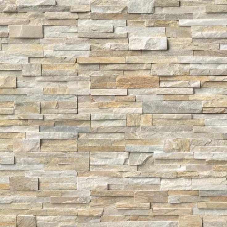 a stone wall that is made out of different types of stones