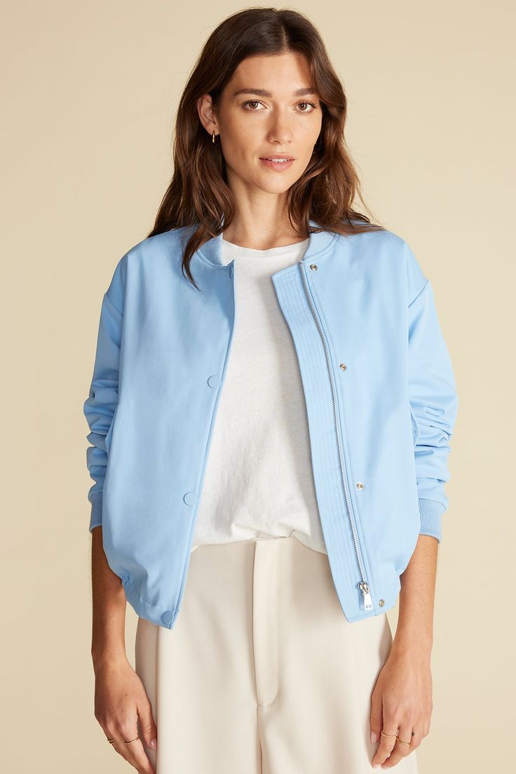 That ideal mix of sporty and sleek, the Jarrel Bomber Jacket works wherever the day takes you. Pair it with jeans and a tee, or drape it over your shoulders with a slip dress for an unexpected twist. DESIGN- Classic fit. Choose your usual size.- Snap-front bomber jacket features long sleeves and hits at the hip with inner adjustable tie at the hem. Fully lined.- Length: 23"FABRIC & CARE- 100% recycled polyester shell- Lining: 100% recycled polyester- Rib: 94% viscose 5% nylon 1% Spandex- Ethical Sweater Blazer, Sweater Sale, Denim Pant, Jacket Sale, Cardigan Jacket, Blouse Dress, Outerwear Jackets, Fabric Care, Sky Blue