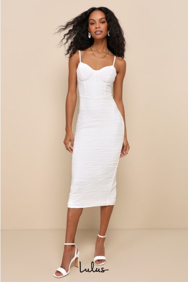 A pair of strappy heels and the Lulus Undeniable Icon White Textured Bustier Bodycon Midi Dress are sure to create the most memorable and sultry look! Stretchy knit fabric, with a wavy raised textured throughout, shapes a sweetheart neckline and a bustier-inspired bodice with padded cups, supportive underwire, and corset-style seam detailing, all supported by adjustable spaghetti straps. The high, fitted waist tops an ultra-flattering bodycon skirt that falls to a chic midi hem with kick pleat a Chic Midi Dress With Sweetheart Neckline And Built-in Bra, Elegant Strappy Dress With Built-in Bra, Chic Fitted Midi Dress With Corset Back, Elegant Fitted Midi Dress With Built-in Bra, Fitted Midi Corset Dress For Spring, Chic Fitted Ruched Corset Dress, Chic Stretch Midi Dress With Sweetheart Neckline, Flirty Fitted Midi Dress With Sweetheart Neckline, Summer Bandage Dress With Sweetheart Neckline For Night Out