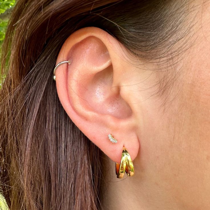 Double the style with our Duo Earrings! Featuring small double hoops, these classic earrings add a touch of elegance to any outfit. Get ready to make a statement with these versatile and fashionable earrings. Everyday Pierced Ear Cuff, Hypoallergenic Yellow Gold Ear Climbers, Trendy Everyday Ear Climbers, Classic Drop Cartilage Earrings, Classic Drop Cartilage Earrings With Matching Set, Classic Drop Wrap Earrings For Pierced Ears, Classic Everyday Ear Climbers With Matching Earrings, Trendy Gold Cartilage Earrings, Classic Wrap Earrings With Ear Wire