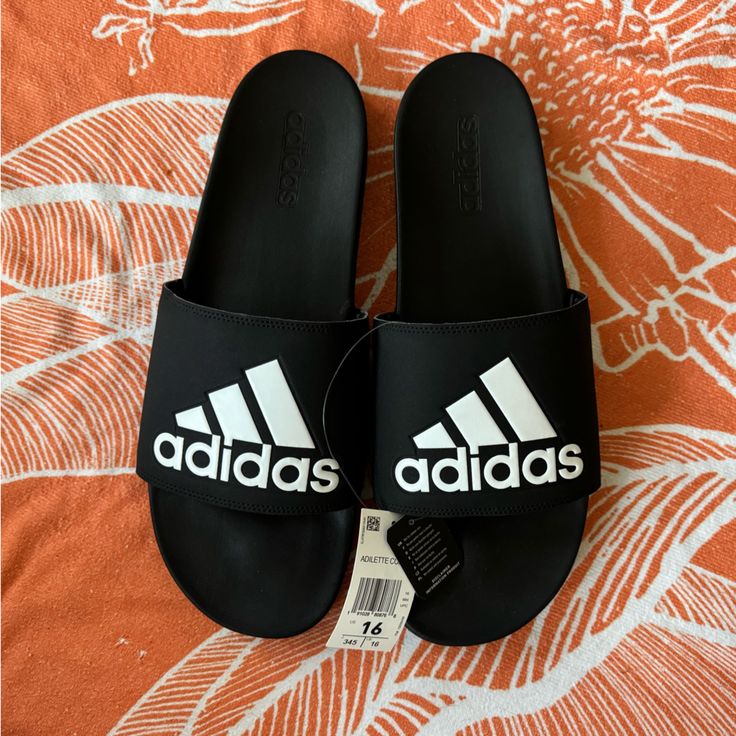 Adidas Adilette Comfort Slides. Men’s Slides. Men’s Classic Adidas Black Sandal Slides With White Adidas Logo Displayed On Top. Comfortable Fit For Every Day. Brand New With Tags. Men’s Size 16. Sandal Slides, Adidas Slides, Classic Adidas, Adidas Adilette, Shoes Adidas, Adidas Black, White Adidas, Adidas Logo, Black Adidas