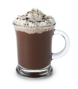 a cup of hot chocolate with whipped cream on top