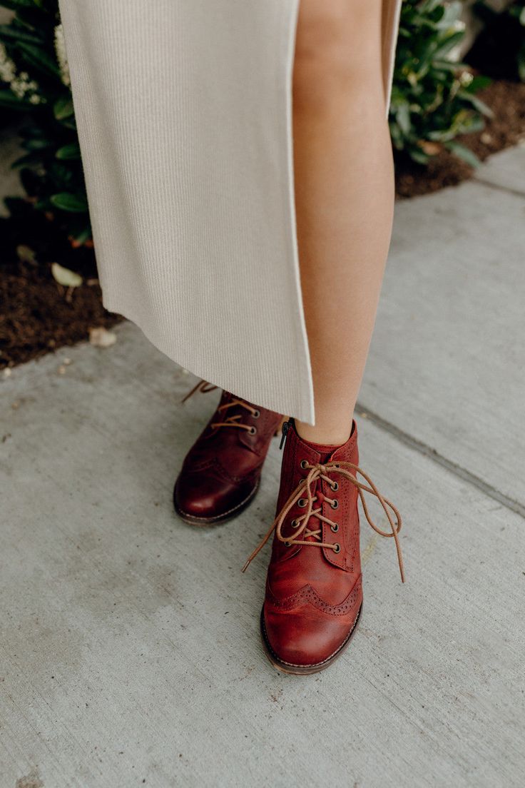 This Americana inspired version of a wingtip boot takes design cues from classic menswear. Due to the beautiful leather used, this boot will only look better with age. Full-grain waxed leather upper takes on a vintage patina with wear Removable padded insole Rough finished heel is shock absorbing Inside zipper for ease of use Soft warm lining Lace-up entry Lace Up Shoes Women, Wingtip Boots, Josef Seibel Shoes, Classic Menswear, Fall Clothing, Black Camel, Classic Fashion, Handcrafted Leather, Up Shoes