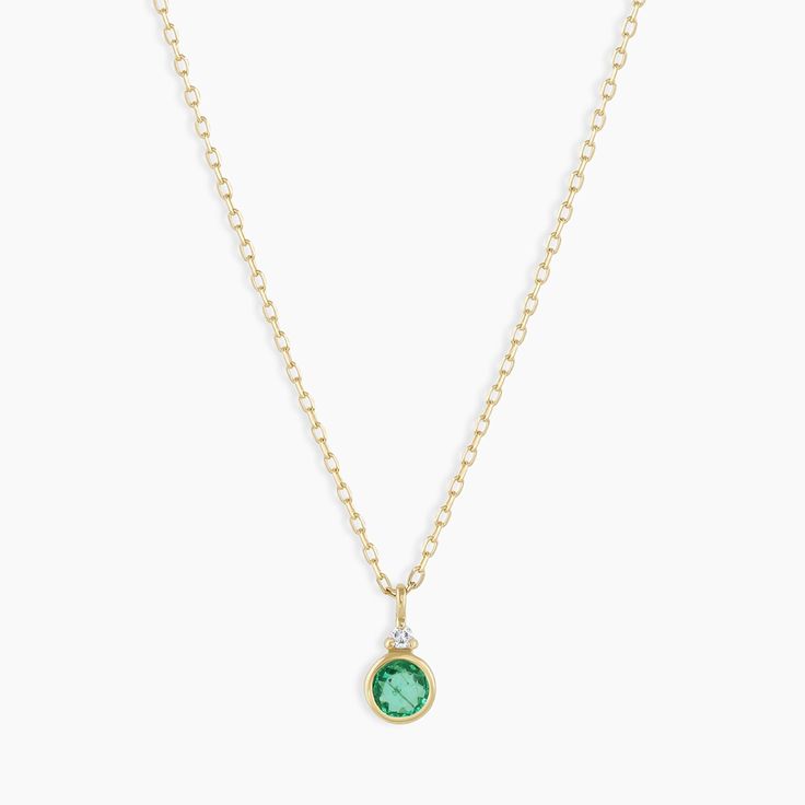 A modern heirloom. Introducing our take on a traditional style. Whether you wear yours or a loved one’s, a birthstone necklace is an easy way to add color and meaning to your look. This birthstone necklace features a 14k gold chain and diamond detail and makes for a perfect, personal gift. Emerald is May's birthstone. Product Details Diamond: 0.01 total carat weight, 1.3 mm GH SI1-SI3 Emerald: 0.15 total carat weight, 3 mm genuine emerald 14k solid gold 16" chain + 2" extender. Adjustable in 1" Color And Meaning, Gold Birthstone Necklace, Necklace Emerald, Emerald Birthstone, Black Labradorite, Orange Agate, Yellow Opal, Iridescent Crystal, Mama Style