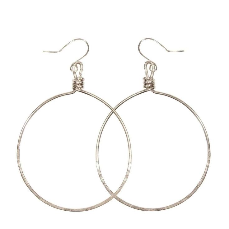 You won’t want to take these hoop earrings off - they are effortless, light and comfortable to wear all day and into the evening. These handmade earrings are perfect for everyday wear. This item is part of the “Hope Line” which consists of introductory pieces made by our new artisans, and tell a powerful story of fresh beginnings. The artisans learn the skill of wrapping wire while making these earrings! 2" drop Available in brass & silver plated brass Sustainably handcrafted by artisans escapin Nickel-free Hoop Earrings For Everyday, Nickel Free Hoop Earrings For Everyday, Metal Open Circle Hoop Earrings, Hypoallergenic Open Circle Hoop Earrings For Gift, Everyday Small Hoop Earrings With Ear Wire, Gift Single Open Circle Hoop Earring, Nickel Free Circular Earrings, Handmade Drop Wrap Earrings For Everyday, Everyday Hoop Earrings With Ear Wire