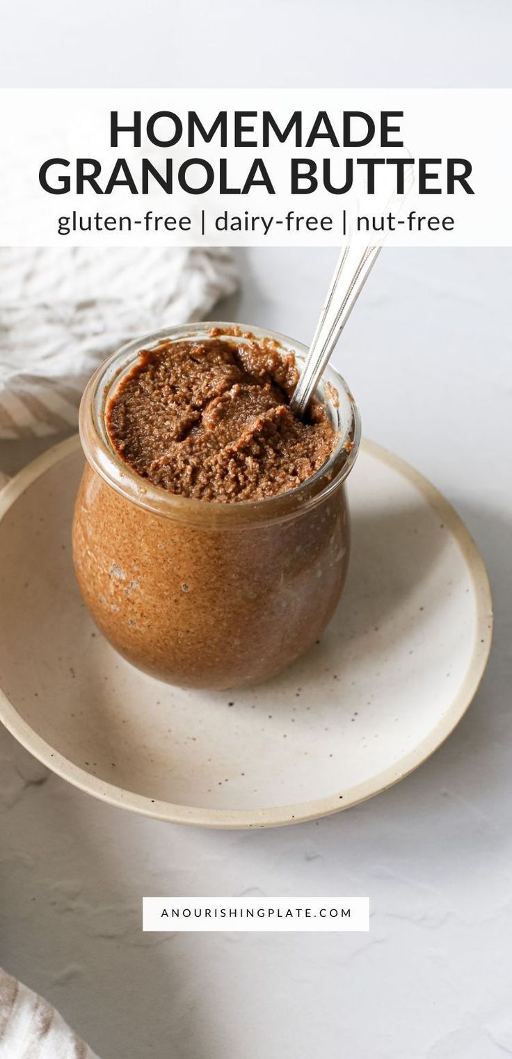 homemade granola butter in a glass jar on a plate