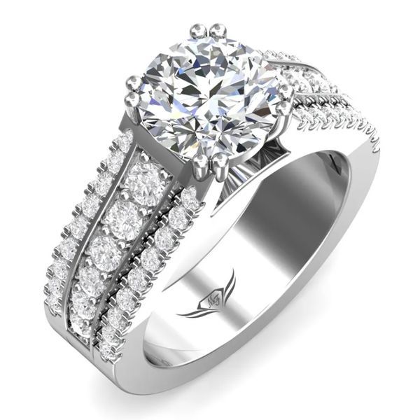 a diamond engagement ring with two rows of diamonds on the band