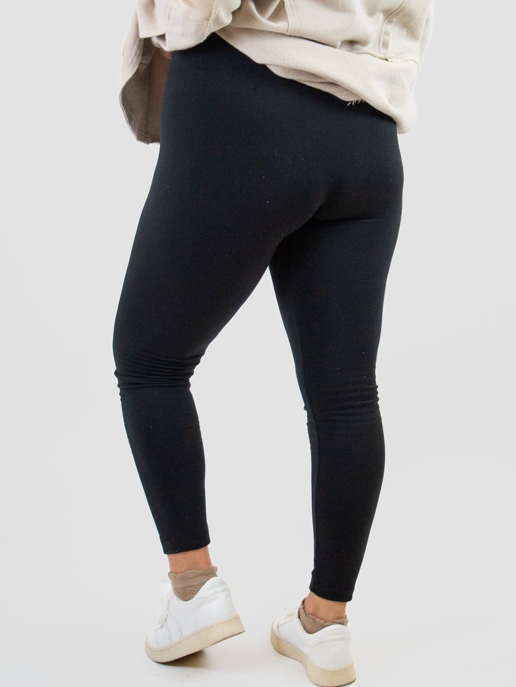 Whether you're dressing up or down, a comfortable set of leggings will do the trick. These fleece leggings have a warmth that will bring a coziness to your outfit and keep you feeling great all day long while doing it. Brushed fleece leggings 5" elastic waistband High waist Generous stretch Soft fabric Comfortable Leggings For Loungewear, Snug Casual Leggings For Loungewear, Casual Snug Leggings For Loungewear, Basic Stretch Activewear For Fall, Basic Stretch Leggings For Loungewear, Casual Winter Workout Leggings, Casual Black Footless Leggings, Cozy Fit Solid Color Leggings For Loungewear, Cozy Winter Leggings For Loungewear