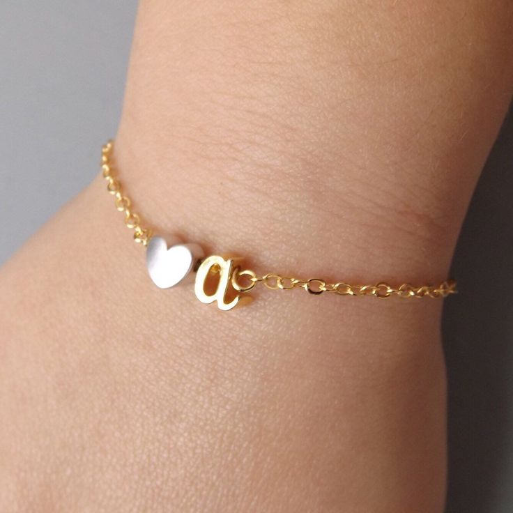 Children's initial bracelet with heart in two tone , mixed metal options or silver plated rose gold plated and 16k gold plated HOW TO ORDER -select size from the drop down menu -choose design -add letter in the notes to seller section at check out --------------------------------- DETAILS -letters are lowercase and cursive (please see last image for full alphabet. -custom made by age -charms are stationary, they do not move --------------------------------- MATERIAL: -Silver plated , rose gold p Personalized Heart Name Bracelet For Best Friend, Customizable Rose Gold Jewelry As A Gift For Her, Customizable Rose Gold Jewelry Gift For Her, Customizable Rose Gold Jewelry, Personalized Heart Bracelet For Best Friend Gift, Personalized White Heart Bracelet For Anniversary, Personalized Name Bracelet For Best Friend Valentine's Gift, Personalized Bracelets For Best Friend On Valentine's Day, Cute Name Bracelet For Valentine's Day Gift