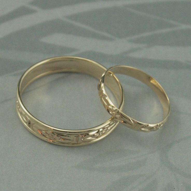 "This listing is for just the wide band. It is hand made from preformed pattern wire for the center and I've added solid 14K gold full round 18 gauge wire soldered seamlessly to each side to form an edge. This makes the band just under 5mm wide and gives it a nice comfort fit edge. I can change the color of the gold wire that edges the wide band to white gold upon request, but the center patterned area is limited to yellow gold. Your ring will be custom made to size and given a high polished fin Heirloom Wedding Rings With Adjustable Fit, Heirloom Wedding Rings Adjustable Fit, Adjustable Engraved Wedding Rings, Heirloom Adjustable Wedding Rings, Heirloom Style Engraved Adjustable Ring For Wedding, Handmade Gold Bridal Sets For Wedding, Adjustable Engraved Ring With Round Band For Wedding, Handmade Yellow Gold Wedding And Anniversary Rings, Handmade Yellow Gold Wedding Rings