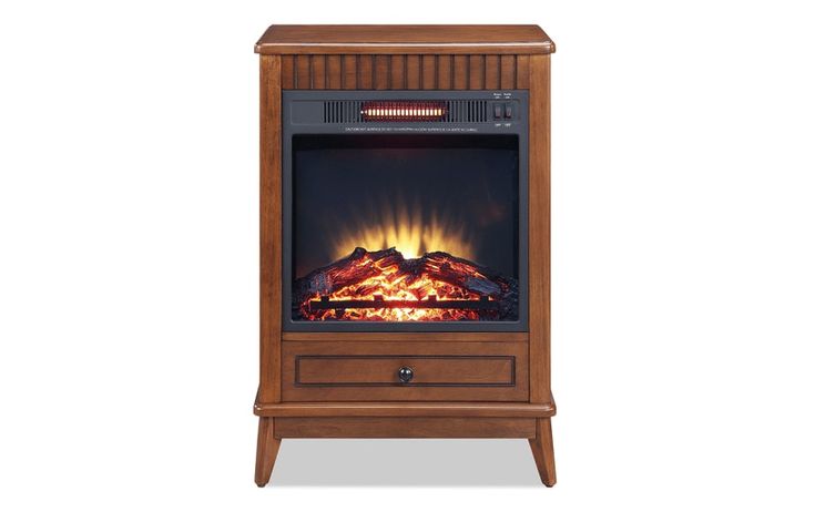 an electric fireplace is shown with the fire burning in it's front and side