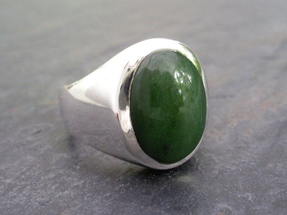 Mens Heavy Oval Nephrite Jade Ring in Sterling Silver Modern Oval Jade Ring, Classic Jade Rings With Polished Finish, Jade Rings With Polished Finish, Oval Cabochon, Classic Green Oval Cabochon Signet Ring, Jade Rings With Polished Finish In Oval Cabochon Shape, Oval Cabochon Jade Rings With Polished Finish, Jade Oval Cabochon Rings With Polished Finish, Elegant Untreated Oval Emerald Ring, Oval Untreated Green Emerald Ring