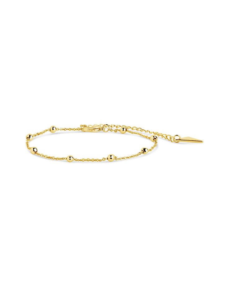 Say 'hello' to the perfect addition to your outfit—the Beaded Station Bracelet! This delicate, dainty piece is definitely the bee's knees; it's the perfect way to bring a little pizzazz to any look. Rock it with jeans and a t-shirt, or dress up an evening gown. Make a statement without saying a word! Materials: 14K gold or rhodium plated brass Features: Measures 6" with 2.25" extender, 0.1" width, 3mm beads, Lead & Nickel free, lobster clasp Adjustable Gold Bracelet With Satellite Chain, Adjustable Delicate Chain Beaded Bracelets, Delicate Adjustable Beaded Chain Bracelet, Dainty Beaded Bracelets With Satellite Chain, Dainty Charm Bracelet With Round Beads, Dainty Beaded Bracelet With Satellite Chain, Dainty Beaded Rosary Bracelet, Adjustable Beaded Bracelets With Satellite Chain, Adjustable Bracelet With Satellite Chain And Round Beads