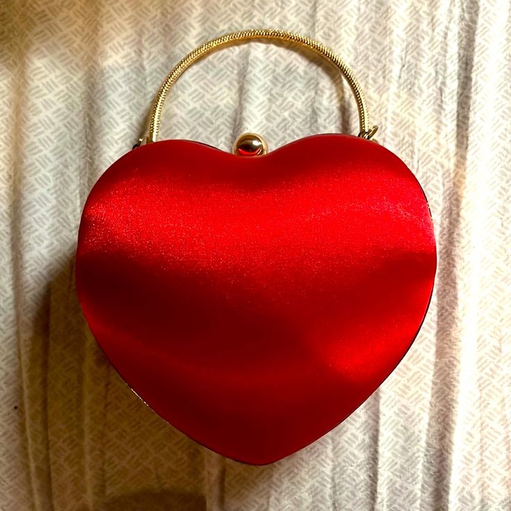 Brand New With Tags Handbag With Chain For Crossbody Satin Questions? Leave A Comment Below! Accepting All Reasonable Offers Trendy Evening Bag For Valentine's Day, Red Clutch Bag For Valentine's Day, Chic Heart-shaped Shoulder Bag For Valentine's Day, Valentine's Day Heart-shaped Party Bag, Trendy Red Heart-shaped Bag, Valentine's Day Evening Crossbody Shoulder Bag, Heart-shaped Evening Shoulder Bag For Valentine's Day, Heart-shaped Formal Bag For Valentine's Day, Valentine's Day Heart-shaped Evening Bag