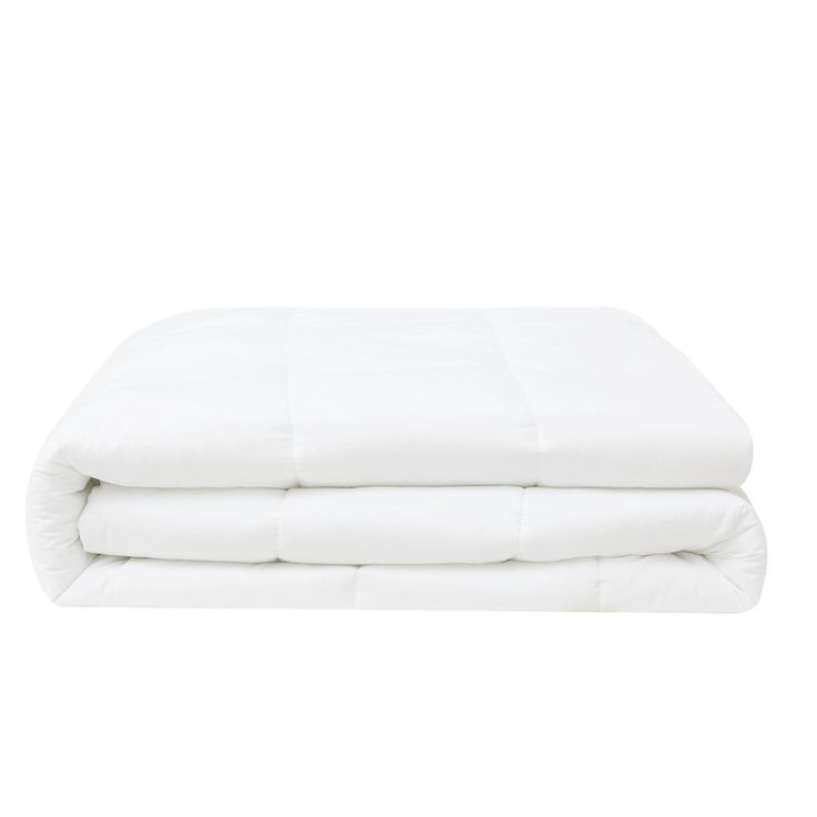 two white pillows stacked on top of each other