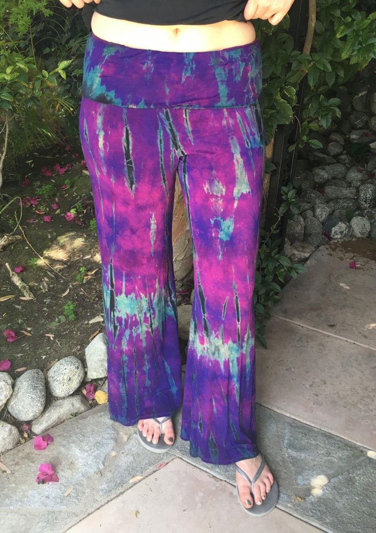 "Tie Dye Pants, Boho, Women's Plus Size, Funky Pants, Womens Leggings, Wide Leg, Palazzo Pant, Yoga Pant, Multi Purple with Blues and Black. Rayon, Fold Over Waistband The Fabric is 95% Rayon/5% Spandex. I recommend wash in cold inside out and hang dry. The fabric is great for travel, just roll it up and hang it up - all of the wrinkles fall right out. Soft and Stretchy, fold over waistband not too tight, Loose leg. These run a little long, but you can hem or just cut them to the length you want Leggings Wide Leg, Leggings Wide, Funky Pants, Dye Pants, Burning Man Fashion, Tie Dye Pants, Palazzo Pant, Wide Leg Palazzo Pants, Boho Pants