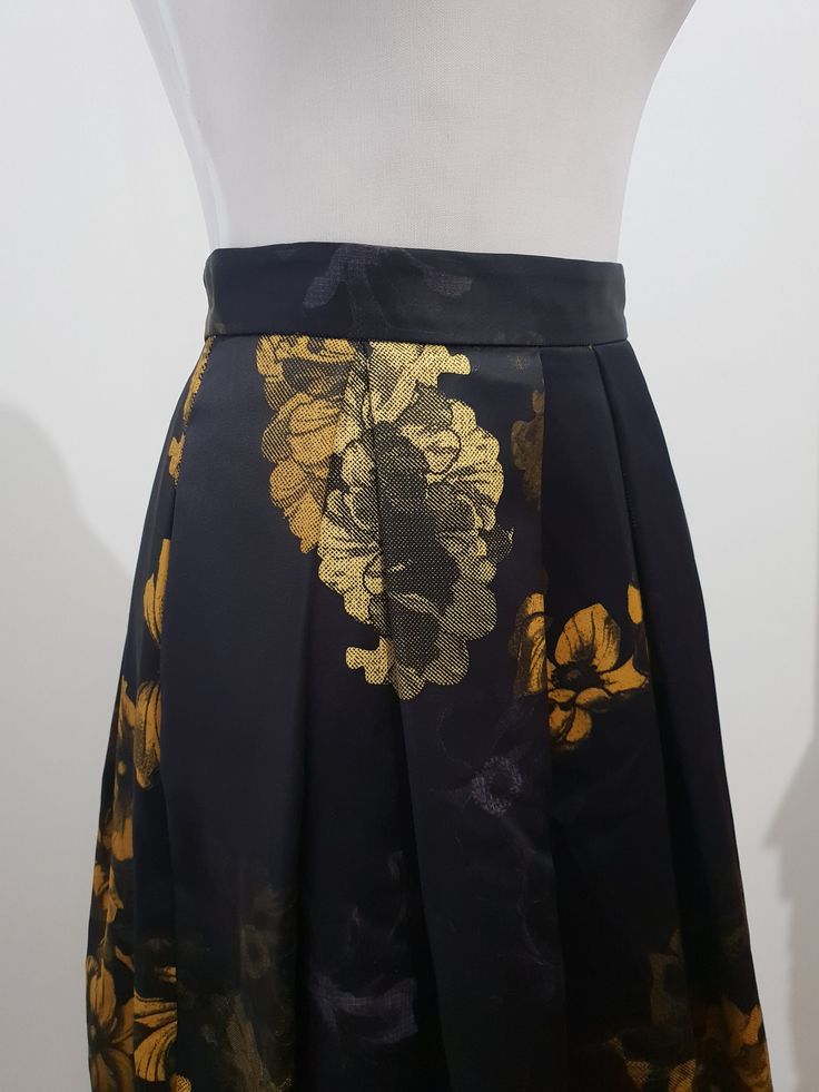 VERONIKA MAINE Yellow & Navy Floral Skirt. Large pleats and a lining of tulle to keep the A-line shape. A silky thick skirt for any occasion - from daywear to night time. Has the tiniest pulls on sides due to the rubbing against accessories. Size 6-8 Measurements upon request. FIND MORE ON INSTAGRAM: ladymedusa_collection Silk A-line Pleated Skirt, Evening Pleated A-line Skirt, A-line Pleated Maxi Skirt For Party, Evening A-line Pleated Skirt With Lining, Silk A-line Flowy Skirt, Formal A-line Maxi Skirt With Lining, Formal A-line Pleated Skirt With Lining, Chic A-line Skirt For Party, Silk A-line Evening Skirt