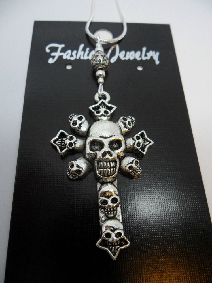 "This is a lovely skull cross themed pendant necklace. The cross is approx. 3cm long x 2cm wide. On an 18\" silver plated snake chain. Thanks for looking!!" Silver Cross Jewelry For Halloween, Silver Skull Print Necklace For Halloween, Halloween Silver Jewelry With Cross Pendant, Halloween Silver Skull Print Necklace, Silver Cross Pendant Jewelry For Halloween, Silver Cross Necklace For Halloween, Halloween Gift Necklace With Cross Pendant, Halloween Gift Cross Pendant Necklace, Gothic Silver Necklace With Skull Print