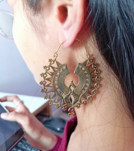 Gold Brass Earrings, Mandala Earrings, Hoop Earrings, Bohemian Earrings, Handmade Earrings, Mothers Day Gift, Minimalist Jewelry 1. Please share your numbers (in personalization box ) as required for shipping address details, and it'll help us to contact you easily. And don't worry about the privacy, we'll keep it safe with us, So try to cooperate with us. :) 2.Customers' satisfaction is our biggest priority, please contact us with any questions/queries for future or existing orders, and we will do our best to make sure you are happy with your order. 3.Please make sure to add the correct address during checkout. You can return your purchased item within 15 days after successful delivery. We offer a 100% "Money Back Guarantee" if you are not satisfied with your purchase. Return charges will Gold Bohemian Wrap Earrings, Gold Bohemian Wrap Earrings For Festivals, Bohemian Gold Wrap Earrings For Festival, Bohemian Teardrop Single Plug Earring, Bohemian Metal Plug Earrings For Pierced Ears, Bohemian Brass Wrap Earrings As Gift, Single Wrap Earring For Festivals, Bohemian Dangle Wrap Earrings For Pierced Ears, Bohemian Gold Wrap Earring (single)