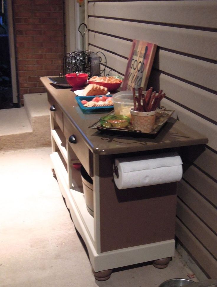 a kitchen island with food on it in front of a door and some other items sitting on top of it