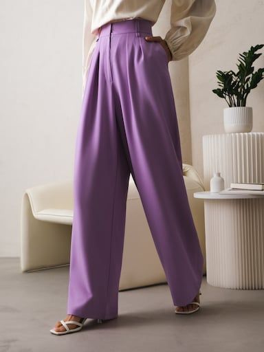 Pleated palazzo pants with creases :: LICHI - Online fashion store Chic Pleated Solid Color Bottoms, Pleated High-waist Wide Leg Pants, Chic Pleated Bottoms, Elegant Baggy Wide Leg Pants, Trendy Pleated Wide-leg Pants, Chic Pleated Ankle-length Wide Leg Pants, Chic Pleated Culottes, Chic Baggy Wide Leg Pants For Fall, Solid Color Pleated Wide Leg Pants