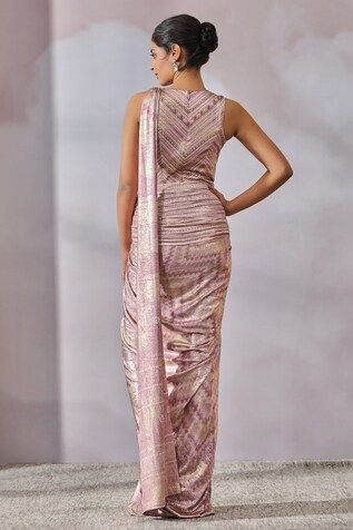 Lilac and multi color foil jersey concept saree with pleated draped panels, attached pallu and all over chevron stripe pattern. Paired with sleeveless bodysuit with sheer yoke panel and bead work highlights. - Aza Fashions Fitted Sleeveless Pre-draped Saree For Festive Occasions, Fitted Sleeveless Pre-draped Saree For Festive Season, Concept Saree, Purple Foil, Drape Saree, Drape Panel, Tarun Tahiliani, Chevron Stripe, Sleeveless Bodysuit