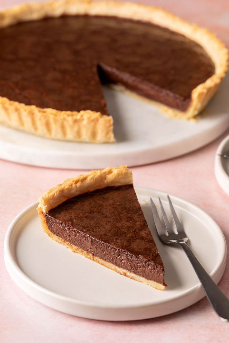 there is a chocolate pie on the plate