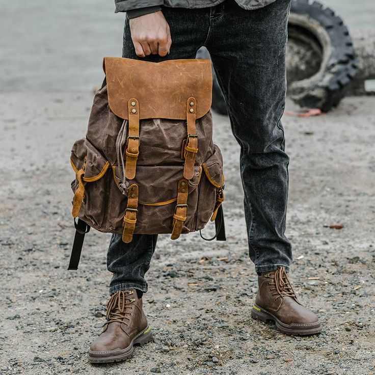 Introducing the ultimate travel companion for adventure enthusiasts and backpackers alike - our genuine leather and canvas travel backpack! Designed with a perfect blend of functionality, style, and durability, this backpack is ideal for those who are always on the move and love to explore. Crafted from premium quality materials, our backpack features a combination of rugged canvas and soft, supple leather. The canvas body of the backpack is not only sturdy and resilient but also water-resistant Functional Waxed Canvas Backpack For Adventure, Brown Canvas Travel Backpack, Brown Standard Backpack For Outdoor, Brown Canvas Backpack For Adventure, Brown Standard Backpack For Outdoor Travel, Rugged Leather Backpack For Outdoor Activities, Brown Travel Backpack For Outdoor, Brown Outdoor Travel Backpack, Adventure Backpack With Leather Trim