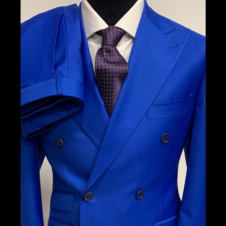 Royal Blue Double Breasted Super 150 Cerruti 1881 Wool Suit Ticket Pocket- Hand Stitched Wide Peak Lapel Double Vents Flat Front Pant 5-7 Day Delivery Time Anywhere In The World From Our Warehouse In Italy. You Will Not Find A Better Suit At This Price Anywhere. If The Fit, Price Point And Quality Does Not Exceed Your Expectations Return It For Refund. Elegant Blue Double Breasted Suit For Semi-formal Occasions, Formal Blue Sets With Notch Lapel, Classic Tailored Royal Blue Sets, Classic Blue Suit Collar Sets, Classic Fitted Royal Blue Sets, Classic Blue Sets With Suit Collar, Elegant Blue Double Breasted Suit For Semi-formal Events, Elegant Blue Sets With Suit Collar, Blue Elegant Formal Sets