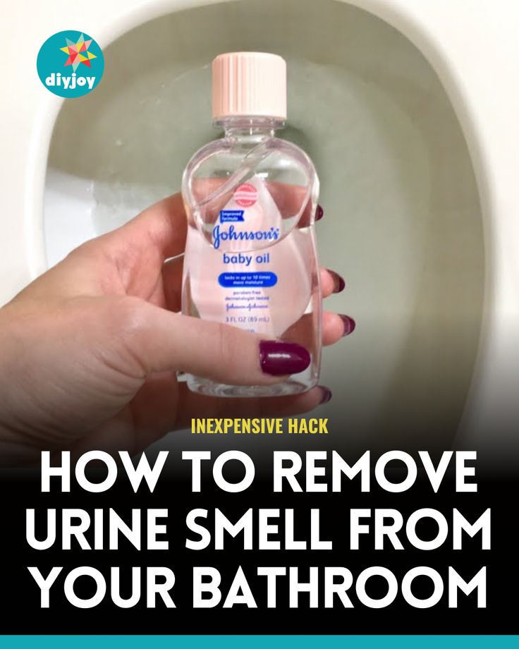 a person holding a bottle of mouthwash in front of a toilet with the words how to remove urine smell from your bathroom