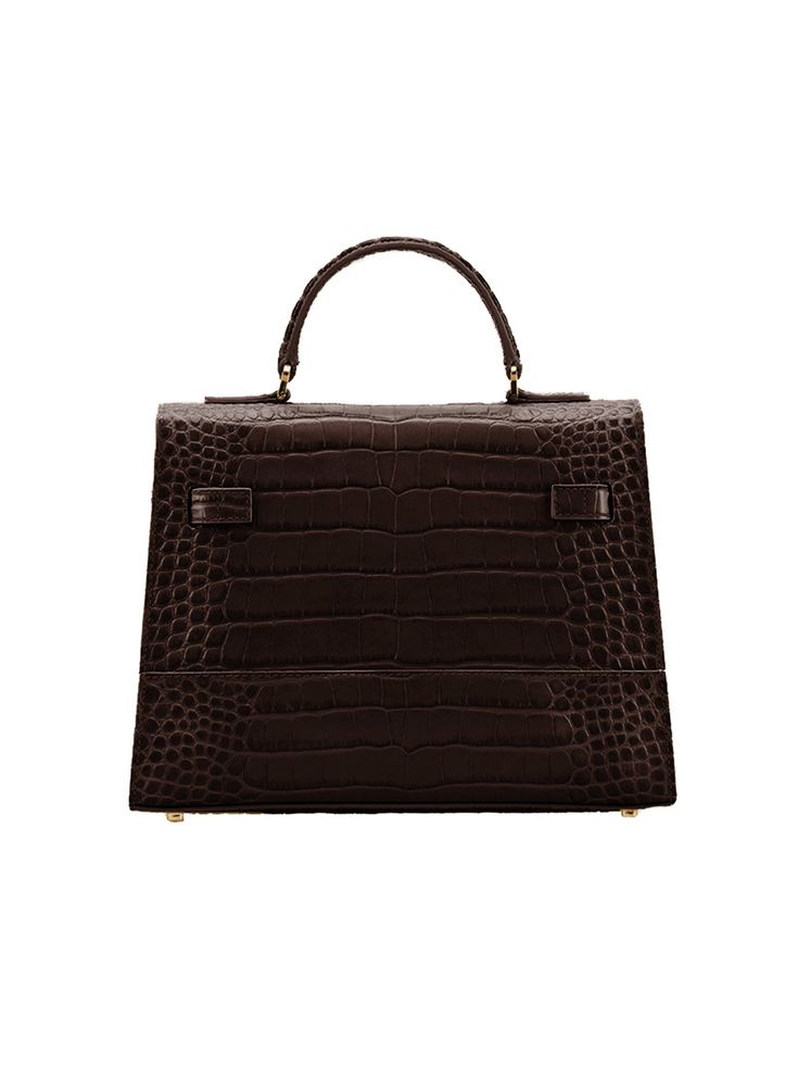 DESIGN
The stunning Kim shoulder bag is perfect for adding a dash of chic to any ensemble. Made in Italy from croco embossed calf skin, this versatile piece has an intriguing look, that will complete any style in a memorable way. This style can be used as a handbags or a shoulder bag, taking you from day to evening with ease.
DESCRIPTION
Made In ItalyCroco embossed leather with matching trimMicrofiber interiorGold-toned detailing
DETAILS
8.6"h x 4"w x 11"l3.4" handle drop35" to 47" detachable/ad Luxury Crocodile Pattern Top Handle Satchel, Luxury Rectangular Satchel With Crocodile Pattern, Luxury Rectangular Shoulder Bag With Crocodile Pattern, Timeless Business Bag With Crocodile Pattern, Luxury Crocodile Pattern Crossbody Bag, Luxury Crocodile Pattern Shoulder Bag, Timeless Crocodile Pattern Bags, Timeless Crocodile Pattern Business Bag, Luxury Crossbody Bag With Crocodile Pattern