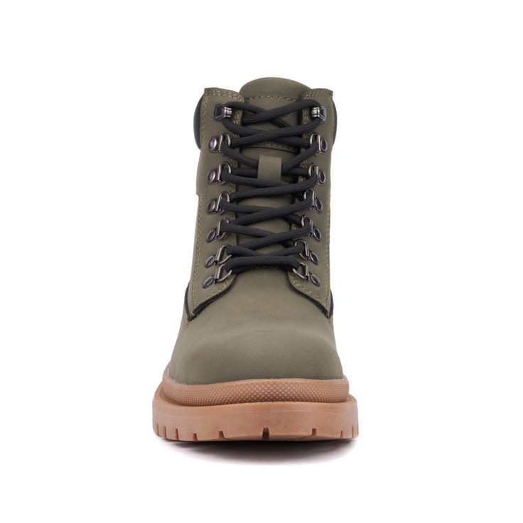 The Myles is an elegant utility boot that seamlessly transitions from work to play with smart style. Crafted for maximum comfort and durability, each pair features a 6-inch shaft, a rugged lugged outsole for superior traction, and reliable D-rings for a secure closure. Whether you're navigating city streets or heading into the wilderness, the Myles boot offers versatility and rugged sophistication. Elevate your footwear with this essential choice that combines timeless design and lasting quality Closed Toe Shoes, Faux Leather Heels, D Rings, The Wilderness, Suede Sandals, City Streets, Thong Sandals, Shoe Shop, Slide Sandals