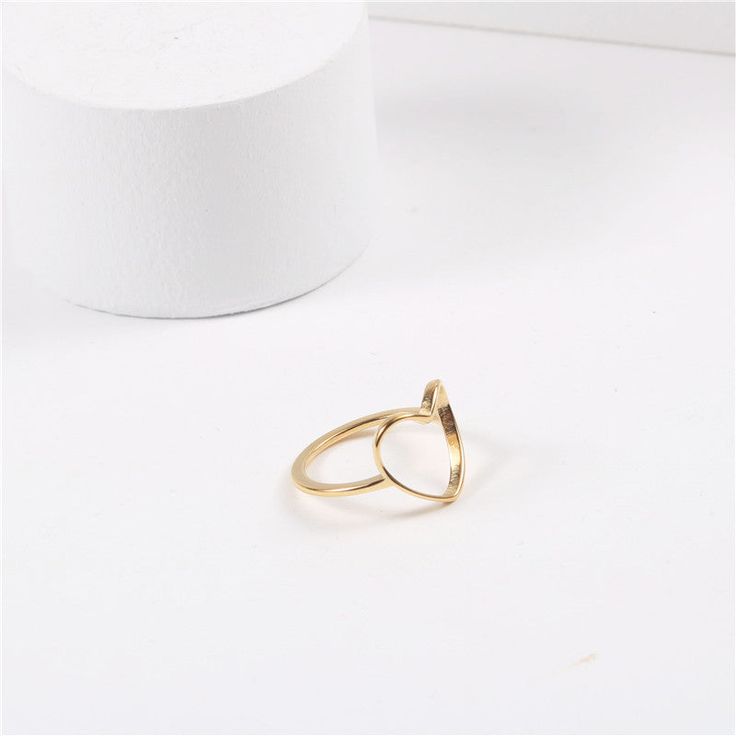 Material: Titanium Steel Fashion Element: Love Heart/Heart Shape Style: Cartoon Adjustable Metal Heart Ring For Valentine's Day, Adjustable Gold Heart-shaped Initial Ring, Adjustable Gold Heart Initial Ring, Metal Heart Ring As Gift, Modern Heart-shaped Rings For Valentine's Day, Heart-shaped Metal Ring Gift, Valentine's Day Metal Heart Ring Gift, Minimalist Heart-shaped Metal Ring, Minimalist Metal Heart Ring