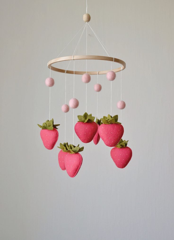 The red strawberry crib mobile is designed to entertain your baby and encourage important development skills. Also is perfect decoration for newborn nursery room, baby girl room, home decor, and baby shower gifts.  Each of my mobiles are hand made with great love, tenderness, care and attention to details - no machines involved.  The composition includes the 7 red strawberries.  Made with high quality wool felt! Toys are filled with hypoallergenic filler - holofiber. MEASUREMENTS: Diameter of th Red And Pink Nursery, Strawberry Nursery Theme, Strawberry Mobile, Strawberry Nursery, Felt Strawberry, Summer Mobile, Summer Nursery, Fruit Baby, Strawberry Baby