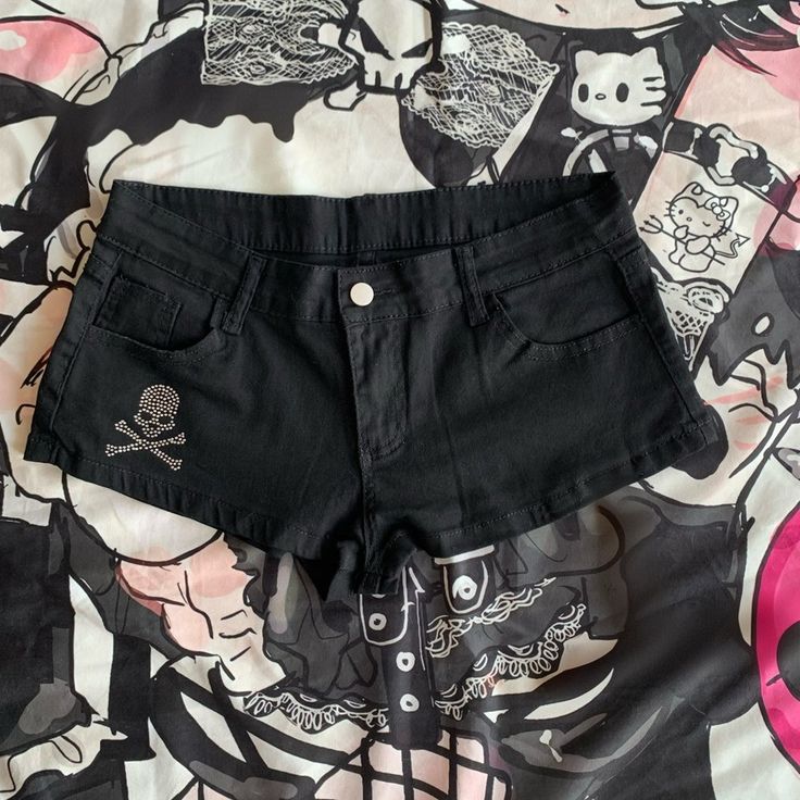 These trendy low-rise denim shorts feature a unique rhinestone skeleton embellishment, making them a standout piece in your wardrobe. Perfect for adding a touch of edginess to any outfit, these shorts are both stylish and eye-catching.  **Options:** 1. One pair of shorts without a leg loop. 2. One pair of shorts with a leg loop.      	 		 			Size 			S 			M 			L 		 		 			Waist 			71 			75 			79 		 		 			Hips 			88 			92 			96 		 		 			Length 			27 			28 			29 Rhinestone Skeleton, Goth Pants, Punk Shorts, Steampunk Fashion Female, Steampunk Fashion Male, Gothic Skirts, Studded Shorts, Punk T Shirt, Flounce Skirt