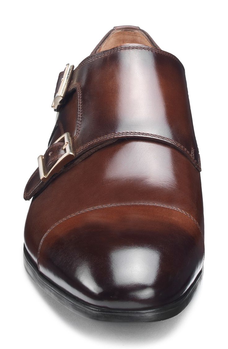 Lustrous, hand-burnished calfskin enriches a fine Italian monk shoe built using Blake construction for lasting style. Slip-on style with two-buckle monk strap Leather upper, lining and sole Made in Italy Men's Shoes Elegant Calf Leather Shoes With Buckle Closure, Classic Monk Strap Shoes In Calf Leather, Timeless Calf Leather Dress Shoes With Buckle Closure, Formal Monk Strap Shoes With Buckle In Calf Leather, Luxury Monk Strap Shoes For Formal Occasions, Luxury Leather Shoes With Buckle Closure, Luxury Formal Monk Strap Shoes, Classic Monk Strap Shoes With Snip Toe For Business, Luxury Calf Leather Monk Strap Shoes For Semi-formal Occasions