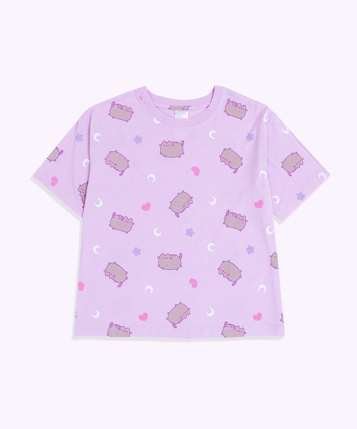 Click to see size chart How dreamy! This lavender Shop Exclusive two-piece pajama set includes a short-sleeve top and lounge pants. The super soft fabric & relaxed fit top is ideal for lounging or sleeping! Ladies fit and sizing. Relaxed-fit pajama tee & pants feature an all-over pattern of Pusheen surrounded by pastel-colored moons and stars. Pajama pants include side pockets and a tapered ankle cuff. Content: 100% Cotton. Imported. Care: Machine wash cold. Only non-chlorine bleach. Tumble dry Casual Graphic Print T-shirt For Pajama Party, Purple Relaxed Fit Sleepwear For Loungewear, Pink Short Sleeve T-shirt For Pajama Party, Purple Short Sleeve Sleepwear For Pajama Party, Comfortable Crew Neck Top For Pajama Party, Casual Cotton T-shirt For Pajama Party, Graphic Print Short Sleeve T-shirt For Pajama Party, Purple Relaxed Fit Sleepwear For Summer, Relaxed Fit Short Sleeve Tops For Pajama Party