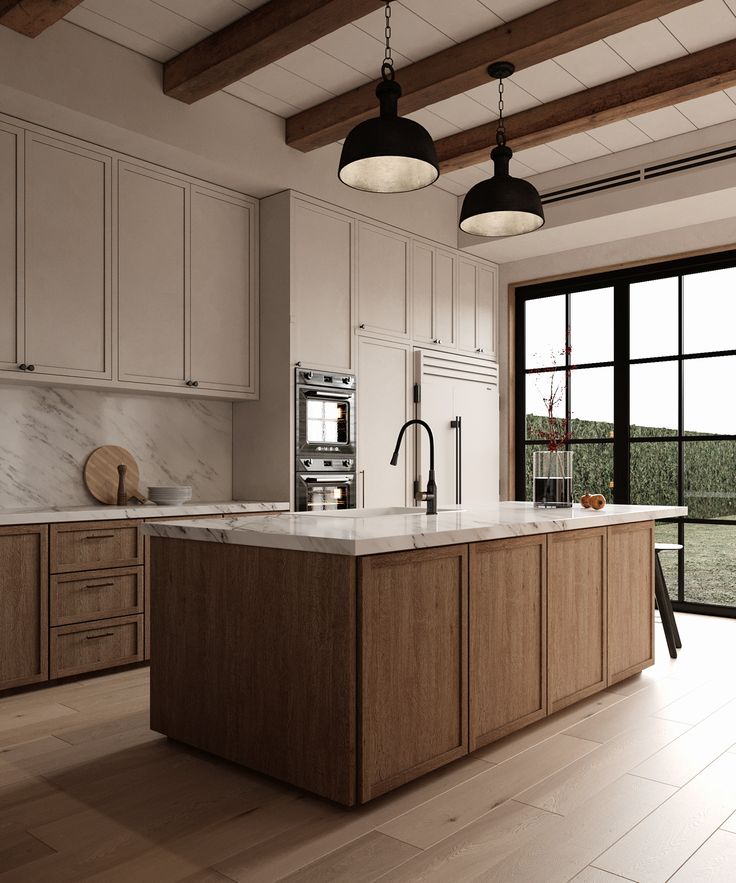 a large kitchen with an island in the middle and lots of cabinets on both sides