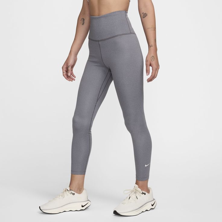 Up for a workout or down to chill, these cozy, heat-regulating leggings are ready for whatever you are. Whether you’re hitting the trails or running errands, the soft, stretchy fabric and multiple pockets help keep you comfortable and prepared. Plus, they're thick enough to keep you covered, so you can stay confident in your deepest bend. Nike Compressive Functional Bottoms, Sporty Yoga Pants For Outdoor Activities, Nike Moisture-wicking Functional Leggings, Nike Functional Moisture-wicking Leggings, Functional Gray Yoga Pants For Gym, Nike Compression Leggings For Functional Fitness, Functional Nike Compression Activewear, Nike Functional Compression Activewear, Nike Functional Activewear For Outdoor