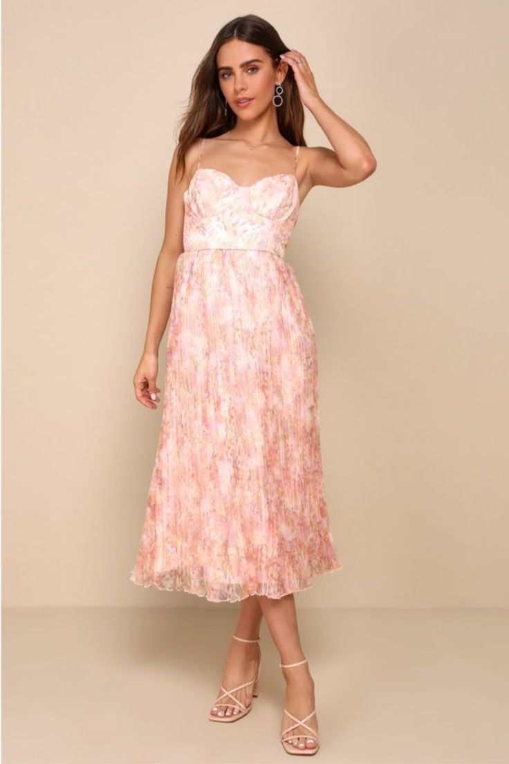 It's easy to sweep everyone off their feet with the exceptional look of the Lulus Finest Endeavor Blush Pink Floral Pleated Bustier Midi Dress! Airy, woven organza-like fabric, with an abstract floral print throughout, shapes this date-ready dress that falls from adjustable spaghetti straps into a sweetheart neckline and a bustier-inspired bodice with seamed cups. High, fitted waist sits atop an accordion-pleated, A-line skirt that finishes at a chic midi hem. Hidden back zipper/clasp. Fit: This Spring Pink Midi Dress With Lined Bodice, Pink Spring Midi Dress With Lined Bodice, Pink Lined Bodice Midi Dress For Spring, Pink Midi Dress With Lined Bodice For Spring, Pink Wedding Guest Dresses, Pleated Bustier, Floral Dress Wedding Guest, Bustier Midi Dress, Party Fits