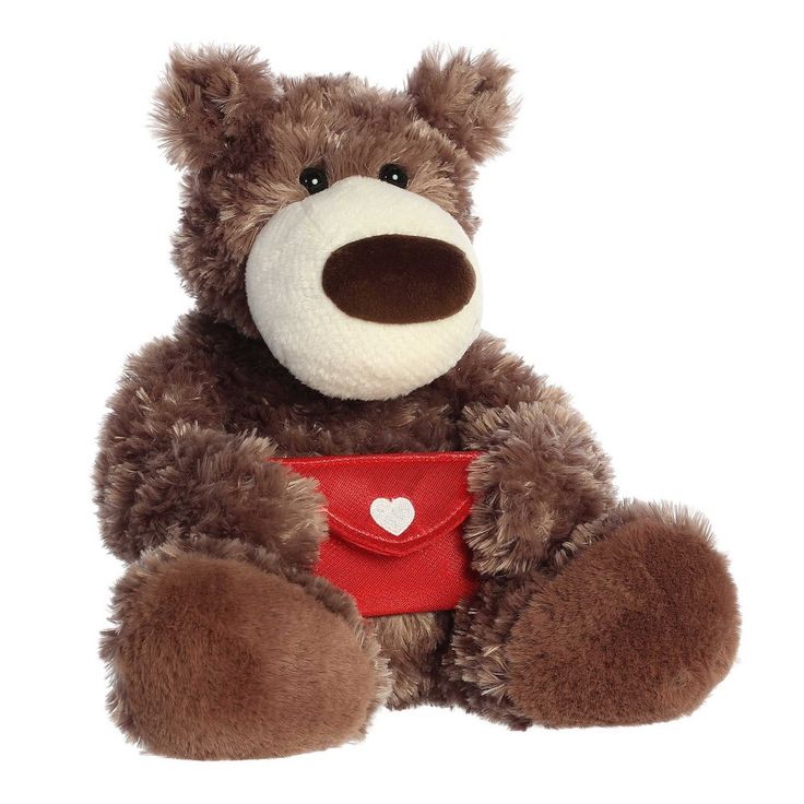 a brown teddy bear with a red heart on it's chest