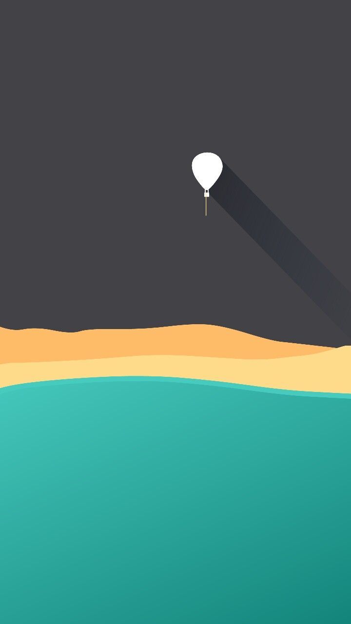 an image of a balloon flying over the ocean