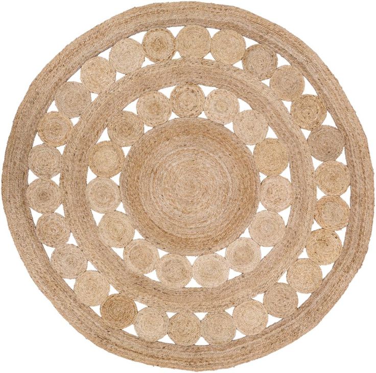 a round rug made out of jute with circles in the middle